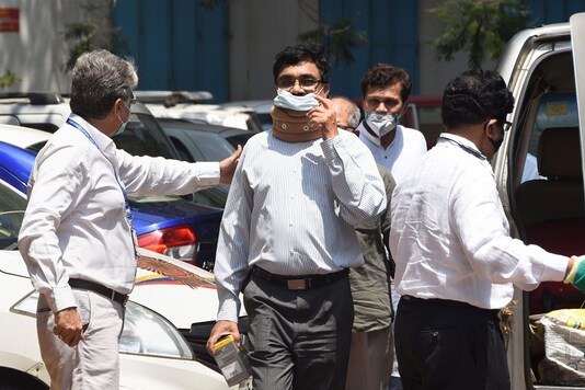 File photo: Activist and scholar Anand Teltumbde arrives to surrender before the NIA  in connection with the Elgar Parishad-Maoist links case, in Mumbai. (PTI Photo)