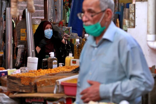 People shop in preparation for the Muslim fasting month of Ramadan, in Baghdad, Iraq. (Image: AP)