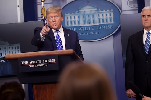 US President Donald Trump points at a reporter during the daily coronavirus disease task force briefing at the White House in Washington, US. (Reuters)
