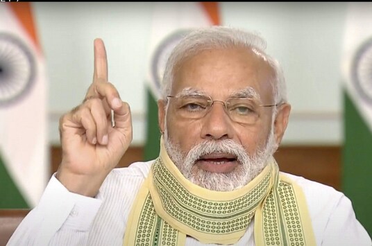 Prime Minister Narendra Modi interacts with 'Sarpanches' from across the country via video conferencing, amid ongoing nationwide COVID-19 lockdown, in New Delhi. (Image: PTI)