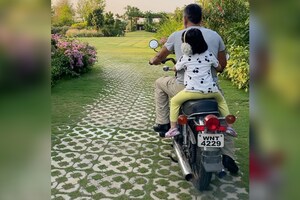 MS Dhoni Enjoys a Spin on His Restored Yamaha RD-350 With Daughter Ziva