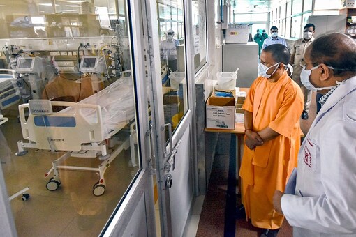 File photo of UP CM  Yogi Adityanath reviewing facilities of hospitals in the state.  (PTI)