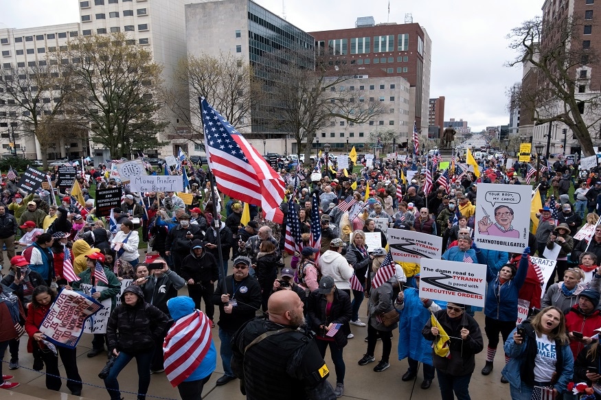 Armed with Rifles, US Protesters Enter Michigan Capitol to Demand