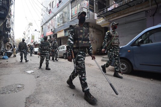CRPF jawans patrol in a residential area during a government-imposed nationwide lockdown. (AFP Photo)