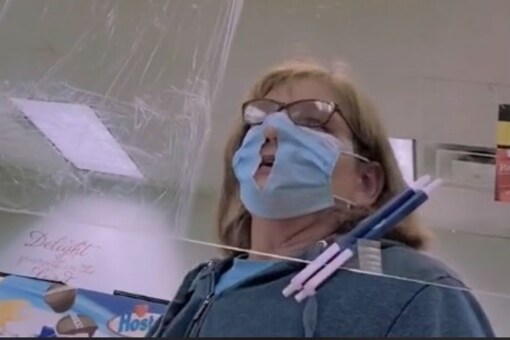 This Covidiot Woman Has Cut a Hole in Her Mask to Help her Breathe