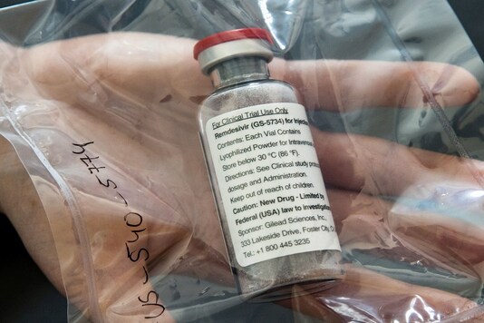 FILE PHOTO: An ampule of Ebola drug Remdesivir is pictured during a news conference at the University Hospital Eppendorf (UKE) in Hamburg, Germany, April 8, 2020, as the spread of coronavirus disease (COVID-19) continues.     Ulrich Perrey/Pool via REUTERS/File Photo