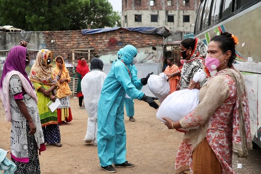 For representation: Volunteers from an organisation distribute relief supplies, amid the coronavirus disease (COVID-19), in Dhaka, Bangladesh. (Reuters)