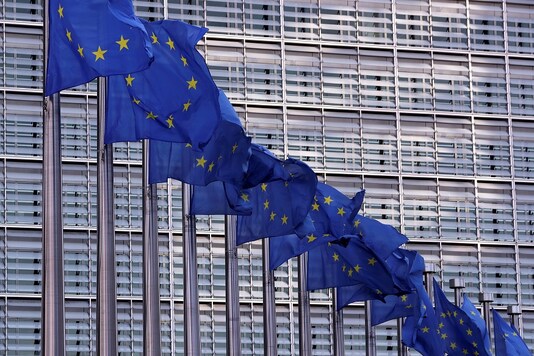 FILE PHOTO: European Union flags fly outside the European Commission headquarters in Brussels, Belgium.

REUTERS/Yves Herman/File Photo