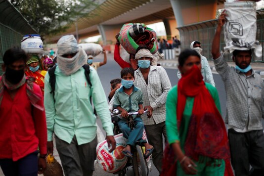 Migrant workers return to their villages amid the coronavirus blockade. (Reuters)