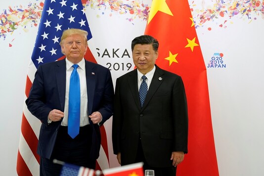 For representation: US President Donald Trump and China's President Xi Jinping pose for a photo ahead of their bilateral meeting during the G20 leaders summit in Osaka, Japan, June 29, 2019. REUTERS/Kevin Lamarque/File Photo