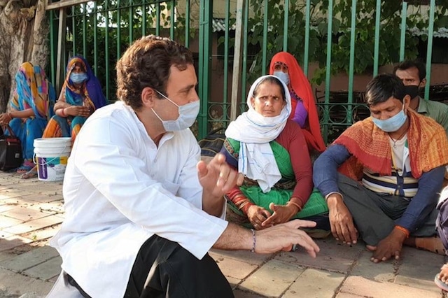 Congress leader Rahul Gandhi interacts with migrant labourers in New Delhi.