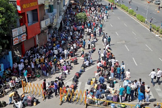 Hundreds Of Migrant Workers Gather On Busy Road Pelt Stones At Police In Ahmedabad