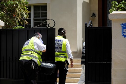 Members of Zaka Rescue and Recovery team enter the residence of China's ambassador to Israel, Du Wei, in Herzliya, near Tel Aviv, Israel on May 17, 2020. (Photo: REUTERS/Nir Elias)