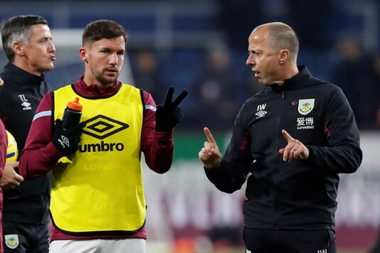 On the right, Burnley assistant manager Ian Woan (Photo Credit: Reuters)