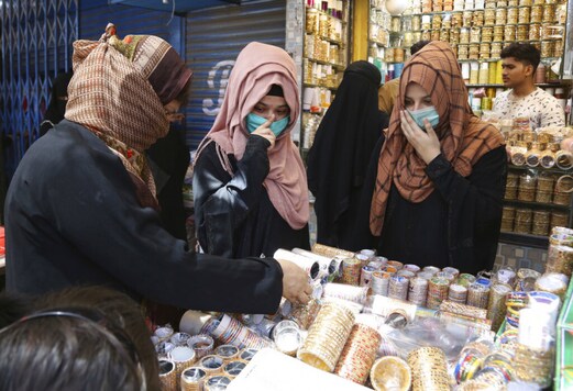 For representation: Women shop for the Eid holiday that marks the end of the Muslim holy fasting month of Ramadan after the government relaxed a weeks-long lockdown that was enforced to help curb the spread of the coronavirus, in Karachi, Pakistan. (Image: AP)