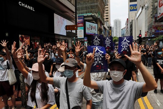 Anti-government protesters march against Beijing's plans to impose national security legislation in Hong Kong, China May 24, 2020. REUTERS/Tyrone Siu