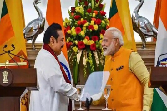 File photo of PM Narendra Modi with Sri lankan PM Mahinda Rajapaksa. (Credit: twitter) 