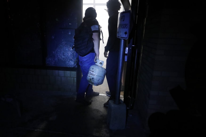  Protesters take over the Minneapolis police 3rd Precinct building, in Minneapolis. (Image: AP)