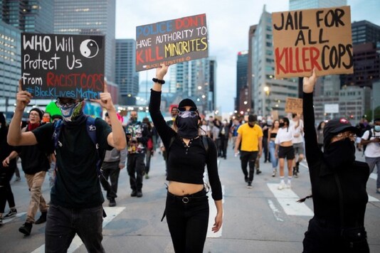 Protesters wearing protective face coverings in United States. (Reuters/File photo)