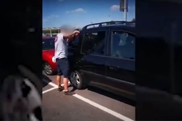 Man Smashes Car Window to Rescue Dog Trapped in Soaring Temperature ...