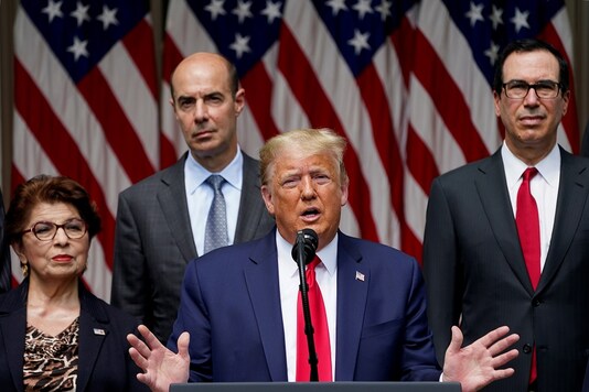 U.S. President Donald Trump talks about a U.S. jobs report amid the coronavirus disease (COVID-19) pandemic as he addresses a news conference as members of his administration listen in the Rose Garden at the White House in Washington, U.S., June 5, 2020. REUTERS/Kevin Lamarque