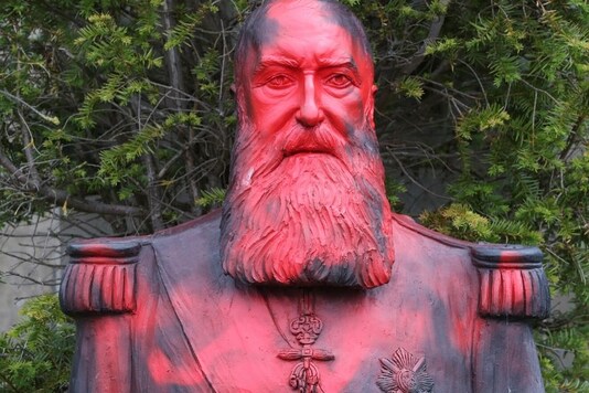 For representation: A statue of former Belgian King Leopold II sprayed with a graffiti is seen in the park of the Africa Museum, in Tervuren, near Brussels, Belgium, June 9, 2020. REUTERS/Yves Herman
