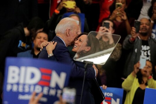 Democratic U.S. presidential candidate and former Vice President Joe Biden is greeted by U.S. Senator Kamala Harris during a campaign stop in Detroit, Michigan, U.S., March 9, 2020. REUTERS/Brendan McDermid
