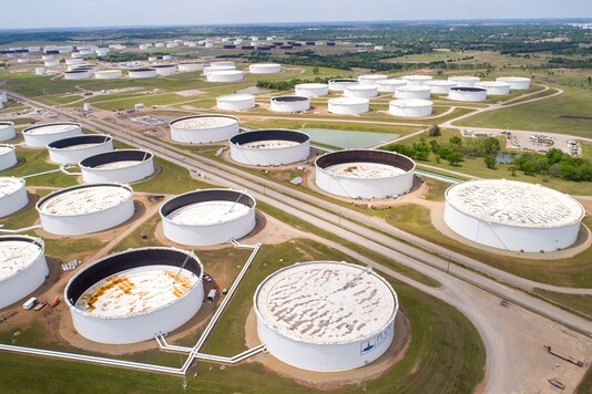 FILE PHOTO: Crude oil storage tanks are seen in an aerial photograph at the Cushing oil hub in Cushing, Oklahoma, U.S. April 21, 2020. REUTERS/Drone Base/File Photo