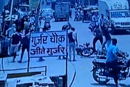 In the video, it is seen that the assailants first stop Noor Alam's motorbike and then thrash him in broad daylight with sticks. (Image: Twitter)