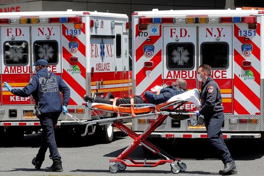 New York City Fire Department (FDNY) EMT's arrive with a patient at St. John's Episcopal Hospital, during the outbreak of the coronavirus disease (COVID-19), in the Far Rockaway section of Queens in New York City, US. (REUTERS/File photo)