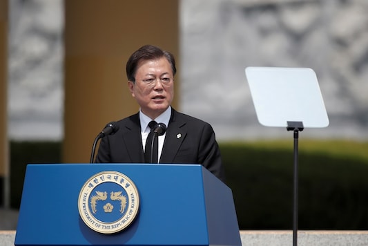 FILE PHOTO:  South Korean President Moon Jae-in speaks during a Memorial Day ceremony at the national cemetery in Daejeon, South Korea,  June 6, 2020. Lee Jin-man/Pool via REUTERS/File photo