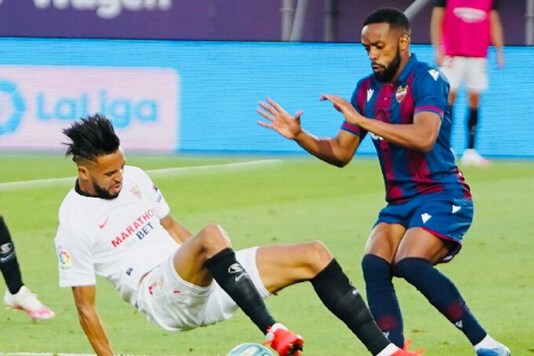 Sevilla (in white) and Levante. (Photo Credit: @SevillaFC_ENG)