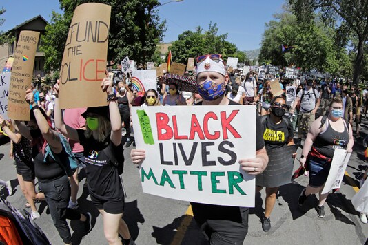 Protesters walk during a Pride for Black Lives Matters march, in Salt Lake City. (AP Photo/Rick Bowmer)