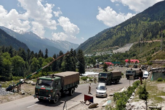 Indian army trucks move along a highway leading to Ladakh, at Gagangeer in Kashmir's Ganderbal district. (Reuters)