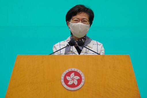 Hong Kong Chief Executive Carrie Lam listens to reporters' questions during a press conference in Hong Kong, Tuesday, (AP Photo/Vincent Yu)