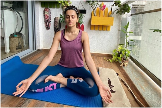 As International Yoga day coincides with solar eclipse 2020, actor Taapsee Pannu while sharing her picture of practising Yoga on social media on Sunday said that an eclipse is the best time to deepen your spiritual practice. (Image: Instagram) As International Yoga day coincides with solar eclipse 2020, actor Taapsee Pannu while sharing her picture of practising Yoga on social media on Sunday said that an eclipse is the best time to deepen your spiritual practice. (Image: Instagram)
