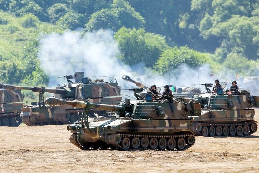 South Korean soldiers take part in a live fire exercise near the demilitarized zone separating the two Koreas in Paju, South Korea, June 22, 2020.   Yonhap via REUTERS