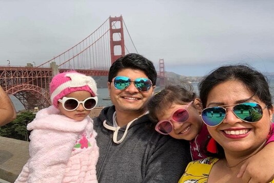 Poorva Dixit and her Kaustubh Talathi pose for a photo with their children in San Francisco, California, US, in this undated handout photo. (Poorva Dixit/Handout via REUTERS)