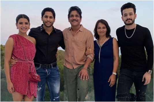 Samantha Akkineni and Naga Chaitanya (L) pose with their family