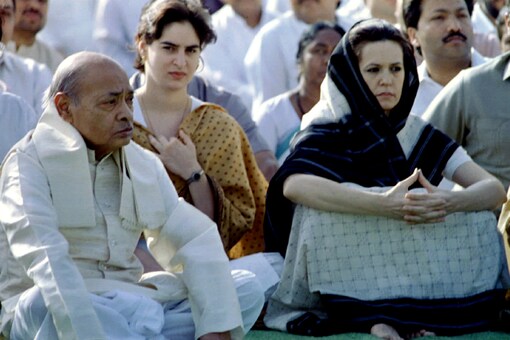 File photo of former Prime Minister P.V. Narasimha Rao (L) and Sonia Gandhi (R) at a prayer meeting to mark the fourth death anniversary of Rajiv Gandhi in New Delhi. (Reuters)