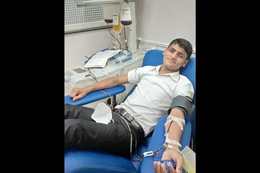 Sikandar, a ward boy at the Max Hospital donates plasma to a Covid-19 patient. 
