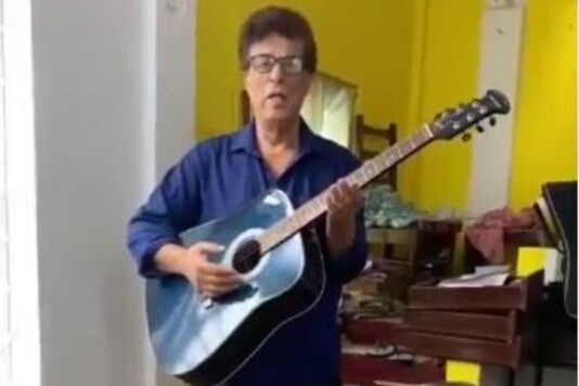 Ex-AIR Artiste Sings in Knee-deep Water as Assam Reels in Flood, Wins Praise for Spreading Cheer
