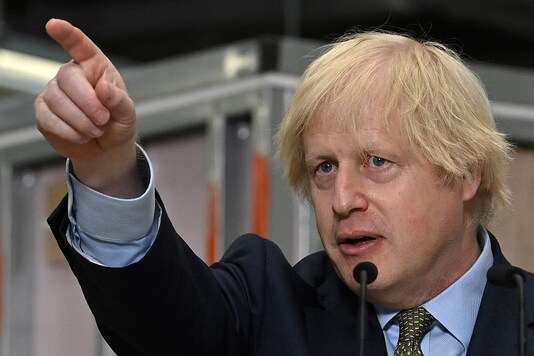 Britain's Prime Minister Boris Johnson gestures as he delivers a speech during his visit to Dudley College of Technology in Dudley, Britain, June 30, 2020.  Paul Ellis/Pool via Reuters