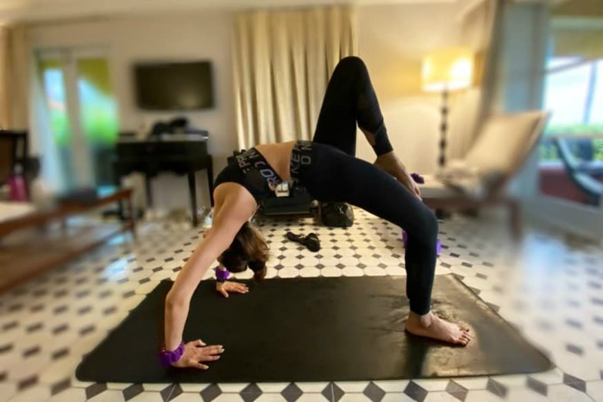 Celebrities Doing Yoga: Photos Of Stars With Their Mats