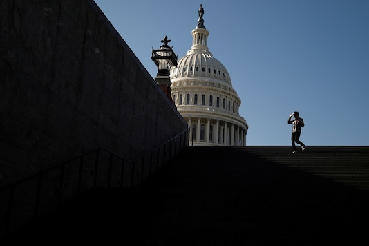 A visitor walks outside of the US Capitol. (Reuters) A visitor walks outside of the US Capitol. (Reuters)