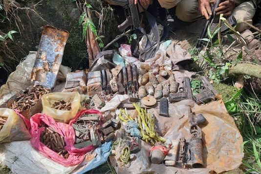 The huge cache of arms and ammunition recovered. (News18) The huge cache of arms and ammunition recovered. (News18)