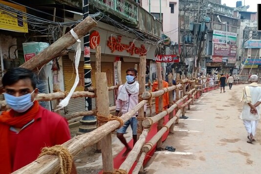 Devotees gather to pray at Kashi Vishwanath temple, Uttar Pradesh. 