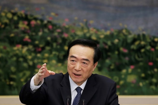 FILE PHOTO: Chen Quanguo, Communist Party Secretary of Xinjiang Uighur Autonomous Region, speaks at the meeting of Xinjiang delegation on the sidelines of the National People's Congress (NPC), at the Great Hall of the People in Beijing, China March 12, 2019. REUTERS/Jason Lee/File Photo