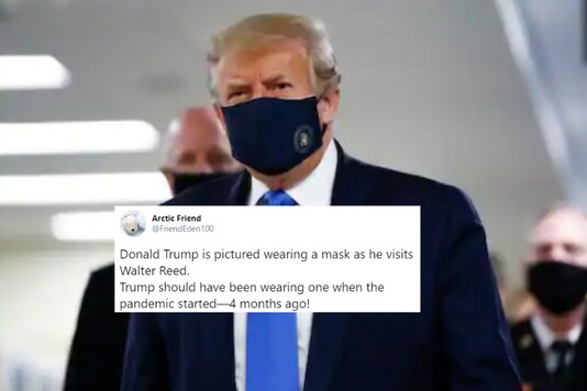 US President Donald Trump wears a mask as he walks down the hallway during his visit to Walter Reed National Military Medical Center in Bethesda, Md. on, Saturday, July 11, 2020. (AP Photo)

