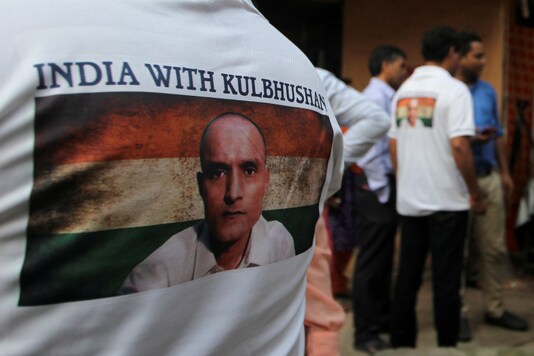 A file photo of Kulbhushan Jadhav on a person's T-shirt in Mumbai. (Reuters)
